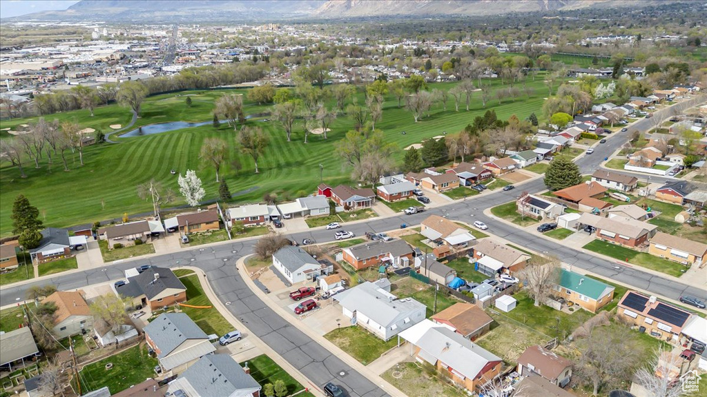 Bird\\\'s eye view featuring view of golf course, a residential view, and a water and mountain view