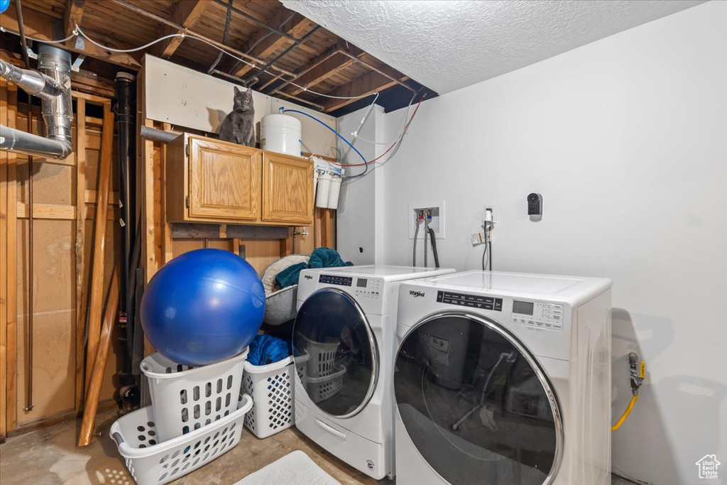 Washroom featuring independent washer and dryer