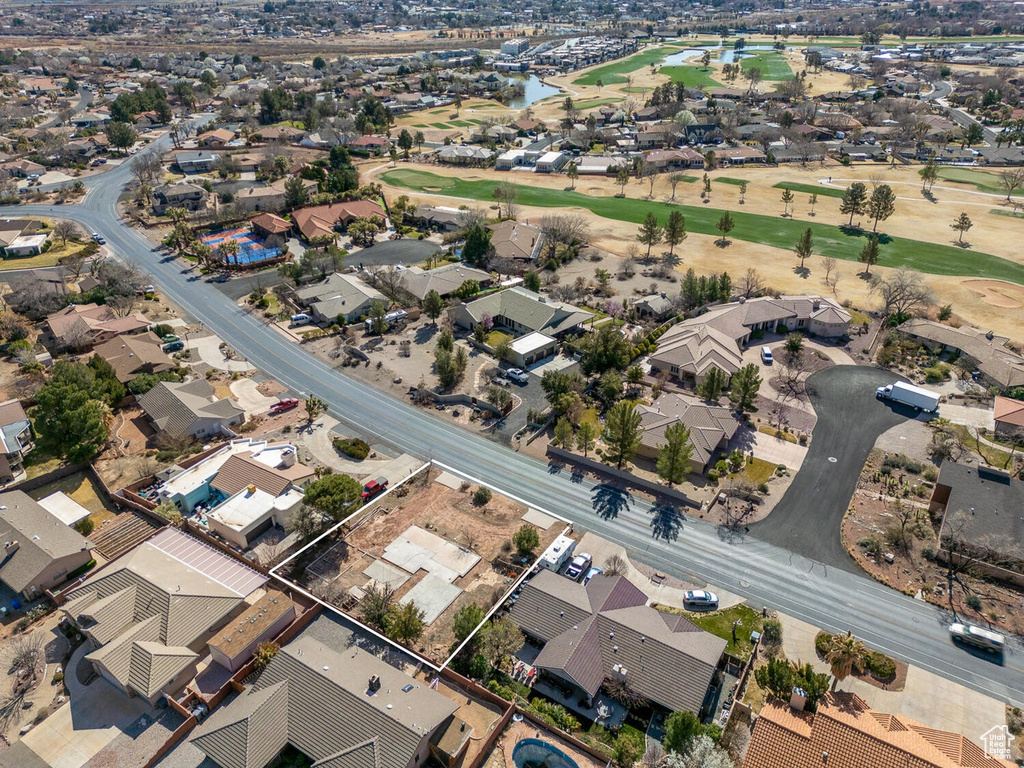 Aerial view featuring golf course view and a residential view