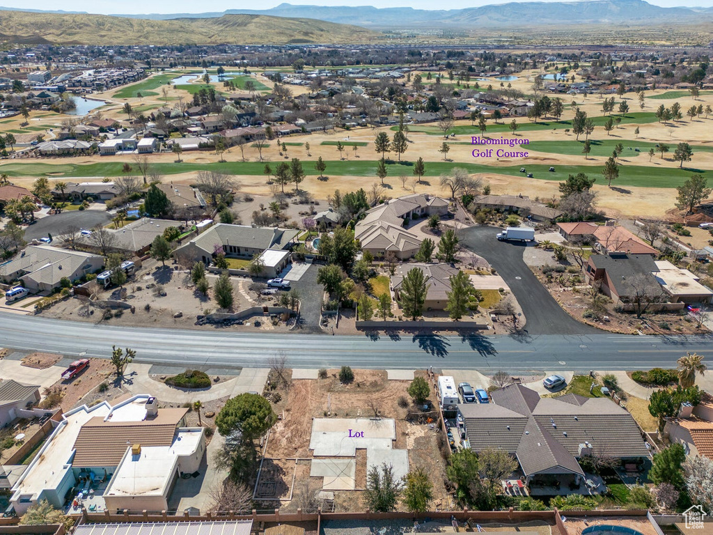 Bird's eye view with a mountain view, golf course view, and a residential view