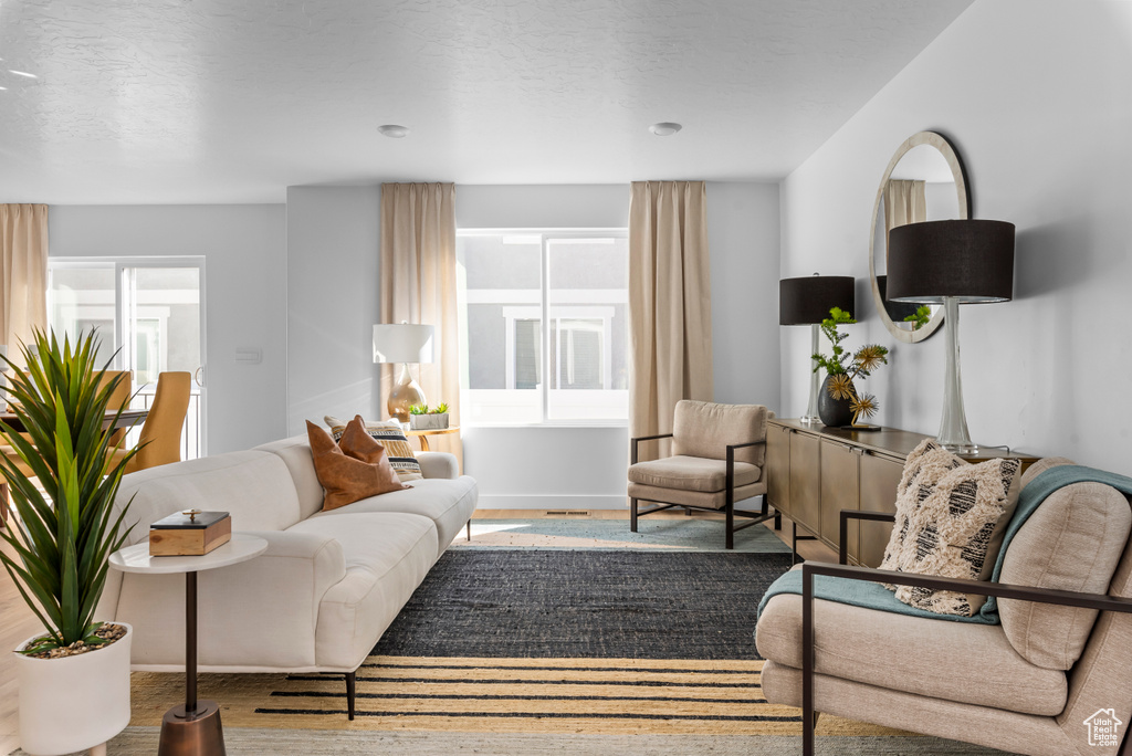Living area featuring wood finished floors
