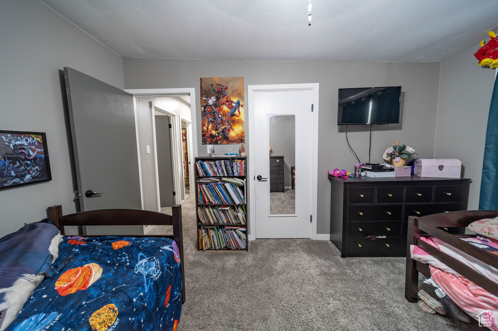 Bedroom featuring carpet flooring