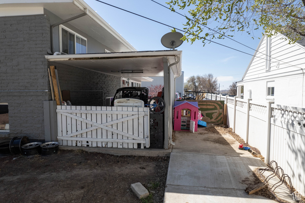 View of property exterior with fence