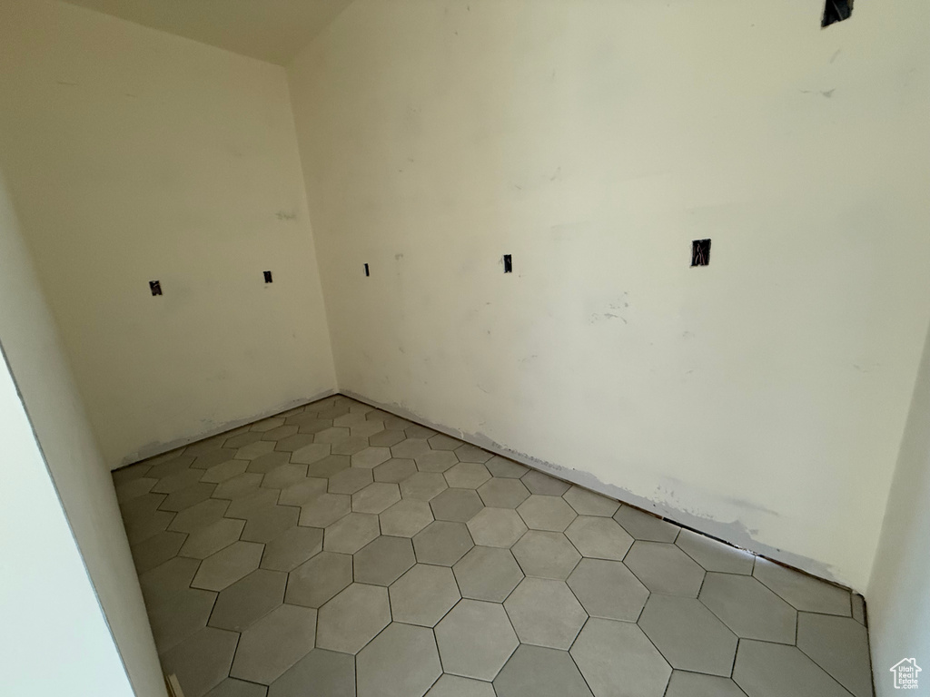 Spare room with light tile patterned floors