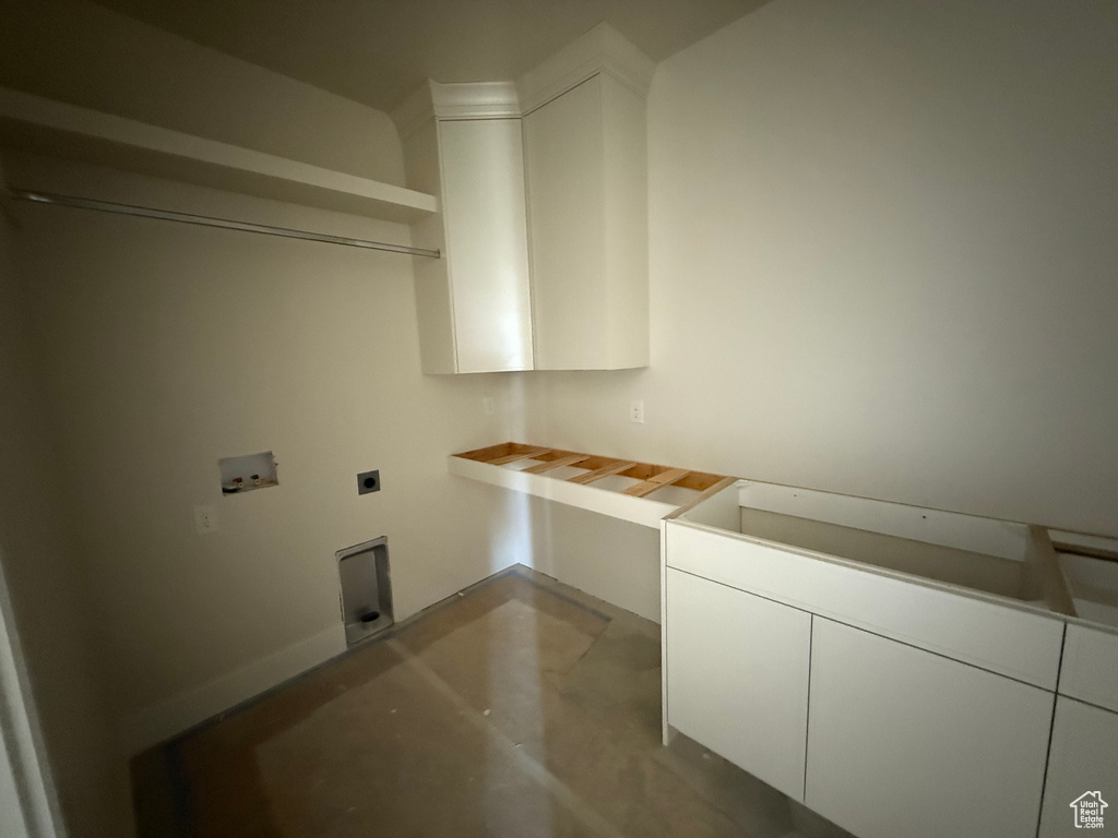 Washroom featuring electric dryer hookup and hookup for a washing machine