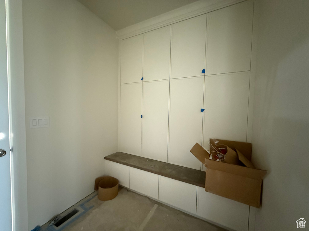 Mudroom with concrete flooring