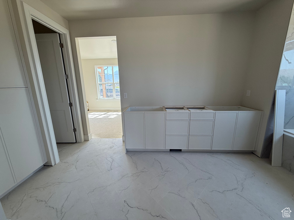 Empty room with light marble finish floors