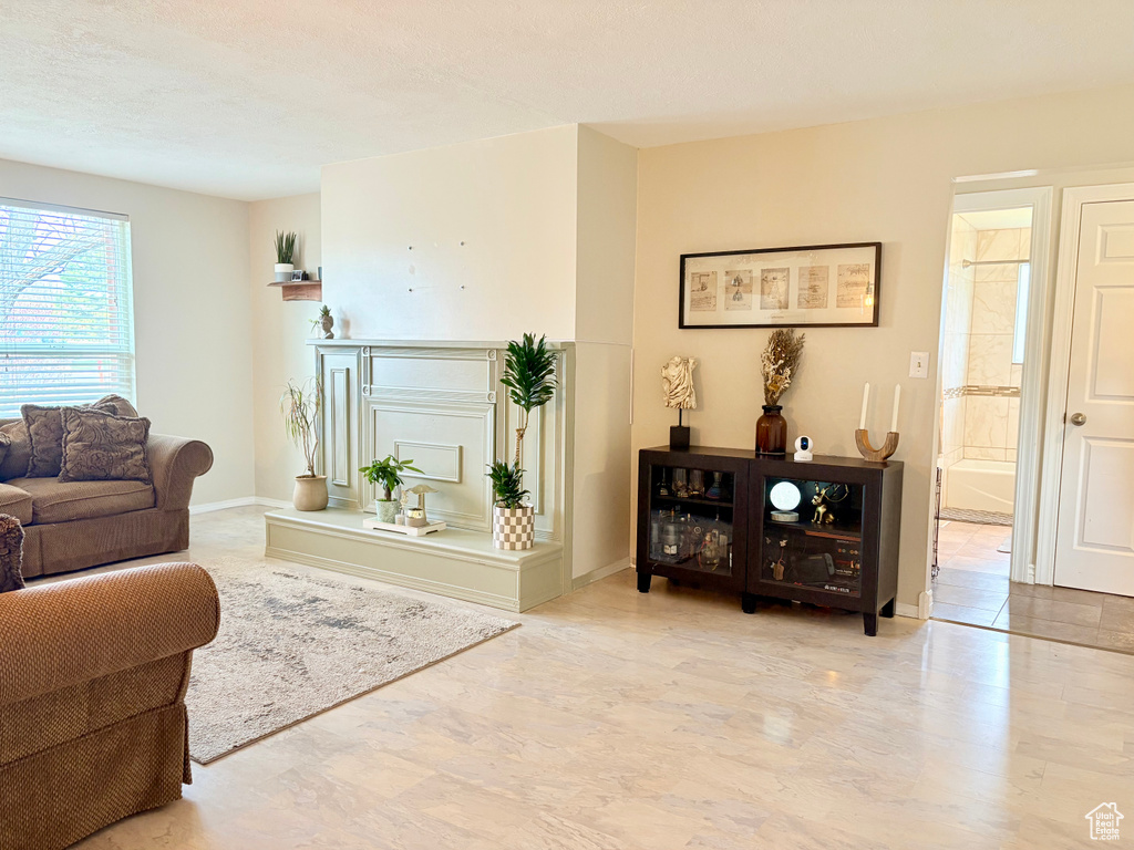 Living room featuring baseboards