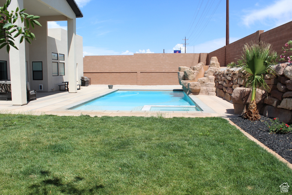 View of pool featuring a patio