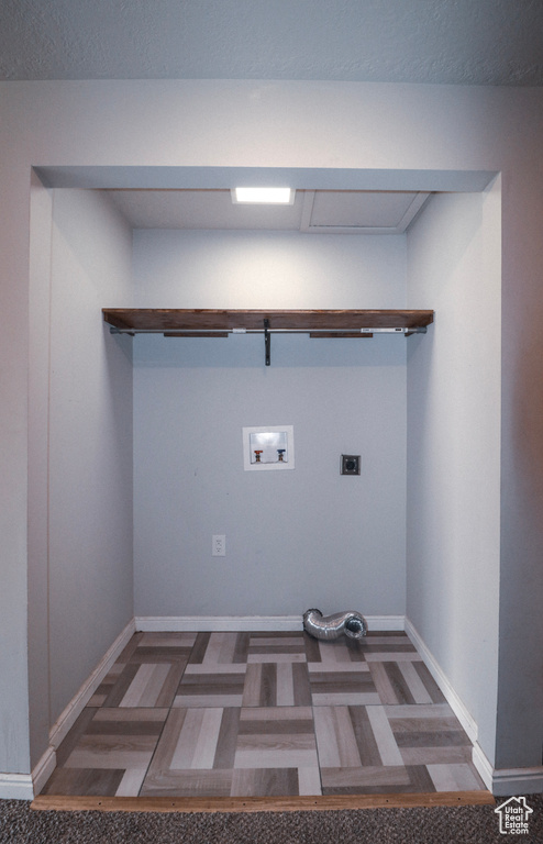 Laundry room featuring washer hookup, baseboards, electric dryer hookup, and laundry area