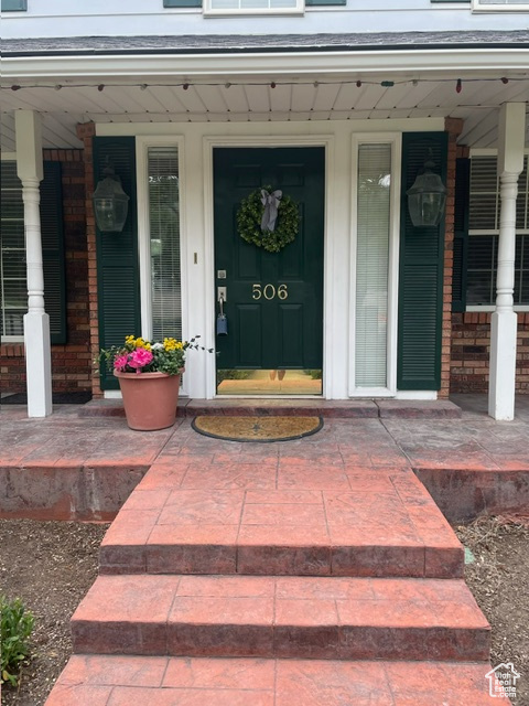 Doorway to property with a porch