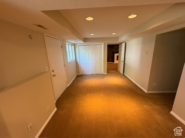 Unfurnished bedroom with recessed lighting, baseboards, and carpet flooring