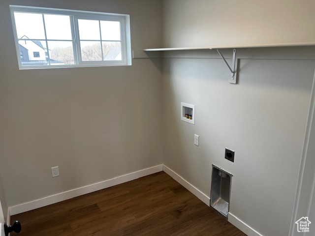 Washroom with laundry area, electric dryer hookup, washer hookup, baseboards, and dark wood-style floors