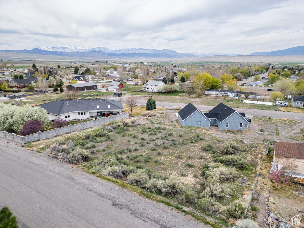 Drone / aerial view with a mountain view and a residential view