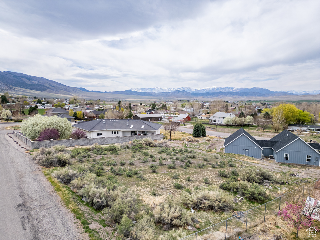 Property view of mountains featuring a residential view