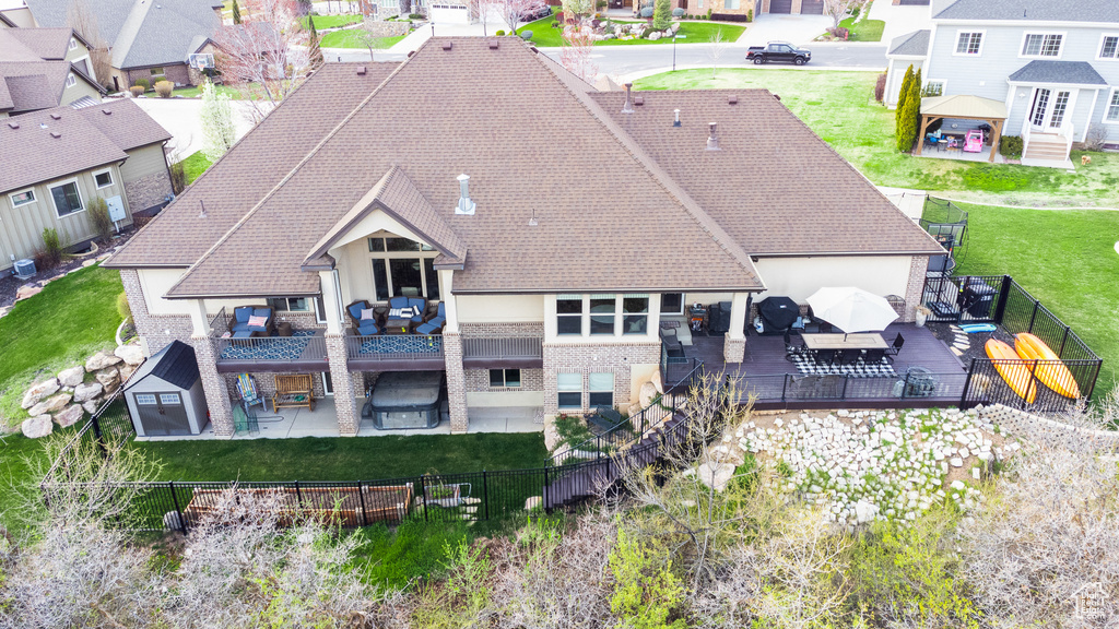 Birds eye view of property with a residential view