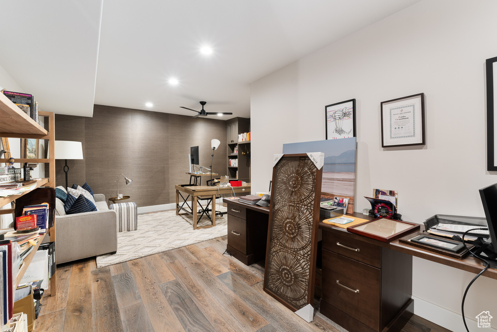 Home office with recessed lighting, light wood-style flooring, baseboards, and ceiling fan