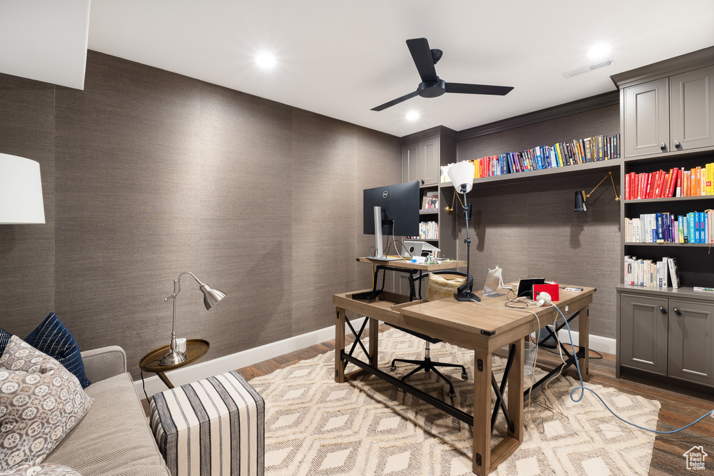 Office area with wood finished floors, ceiling fan, baseboards, visible vents, and recessed lighting