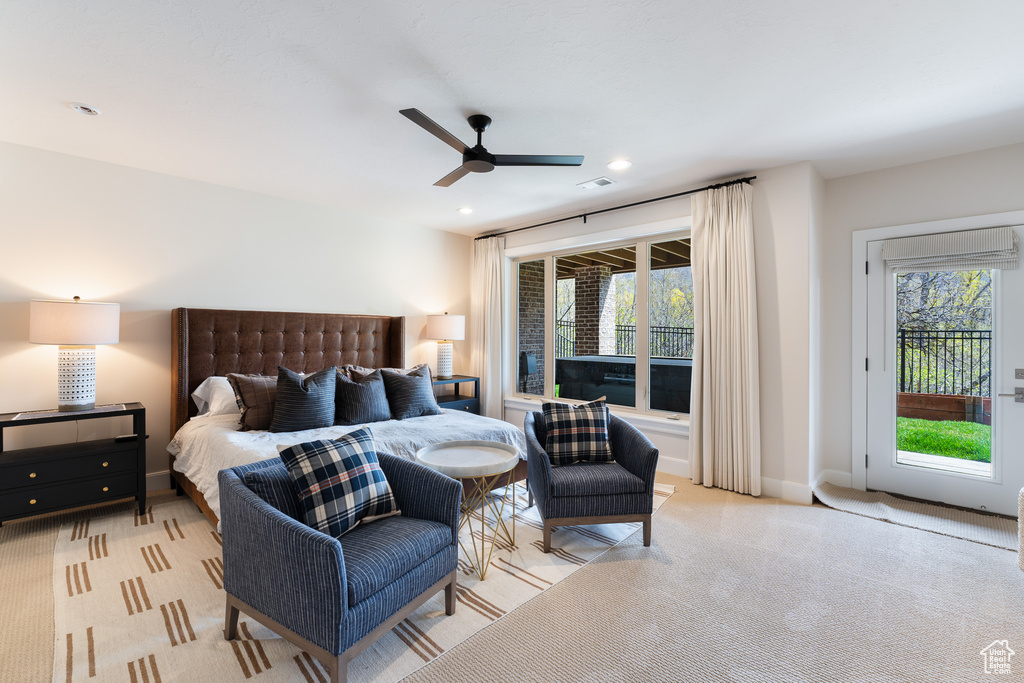 Bedroom with recessed lighting, visible vents, light carpet, access to outside, and ceiling fan