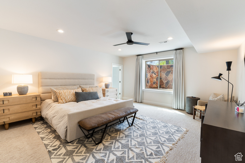 Bedroom featuring recessed lighting, visible vents, a ceiling fan, and light colored carpet