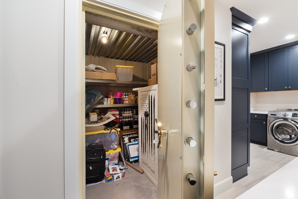 Washroom with washer / dryer and cabinet space