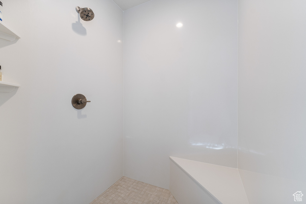 Bathroom with a tile shower