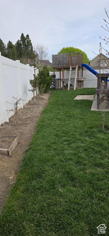 View of yard with fence