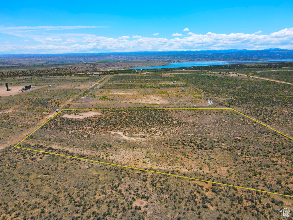 Overview of rural landscape featuring property parcel outlined and a water and mountain view
