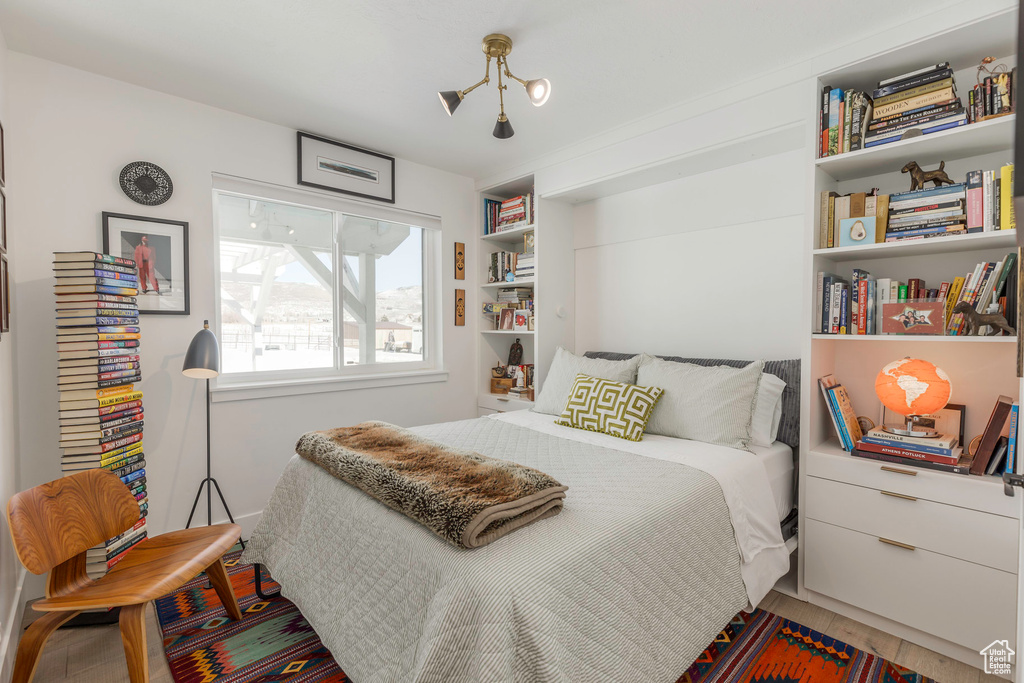 Bedroom featuring wood finished floors