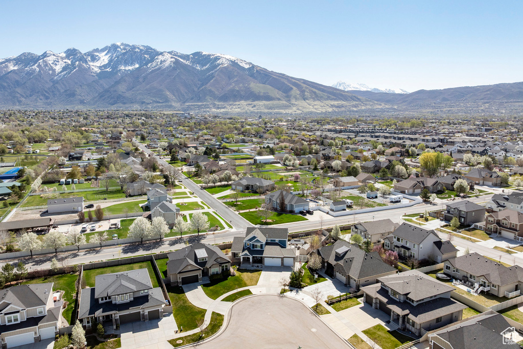 Birds eye view of property featuring a mountain view and a residential view