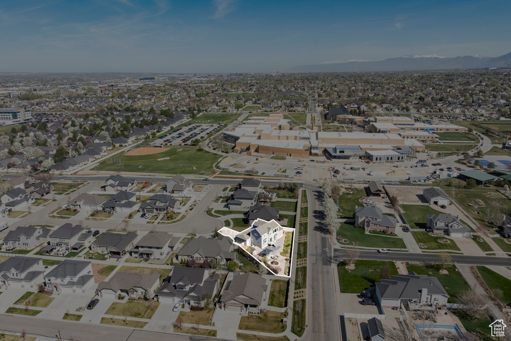 Drone / aerial view featuring a residential view and a mountain view
