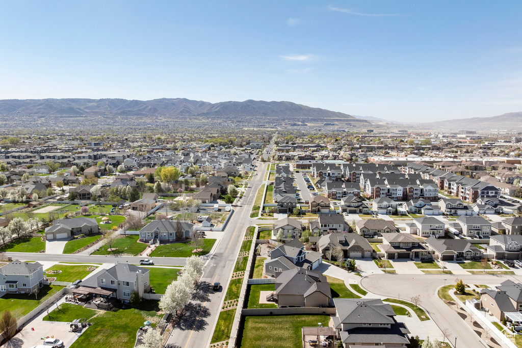 Birds eye view of property featuring a mountain view and a residential view