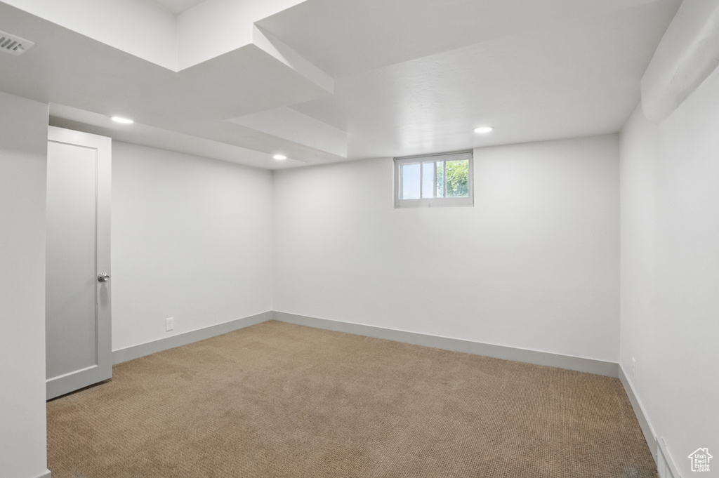 Below grade area with carpet floors, recessed lighting, and baseboards