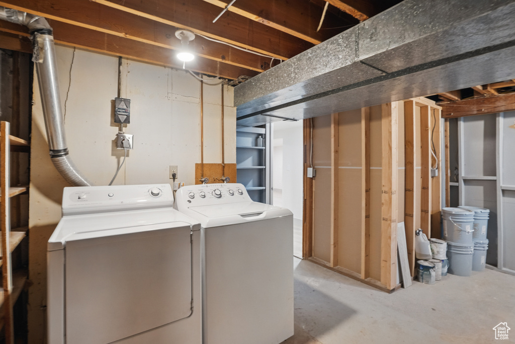 Laundry room featuring independent washer and dryer