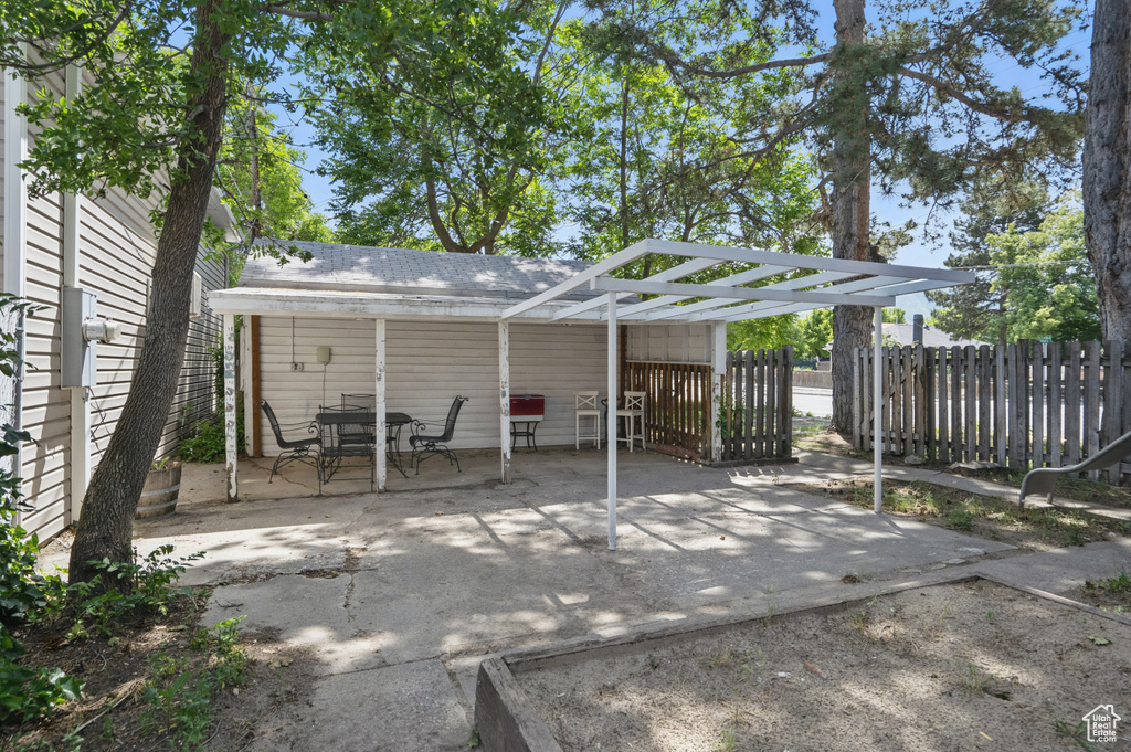 View of patio with outdoor dining area