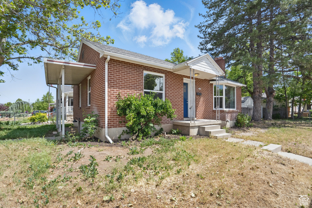 View of front of property with brick siding