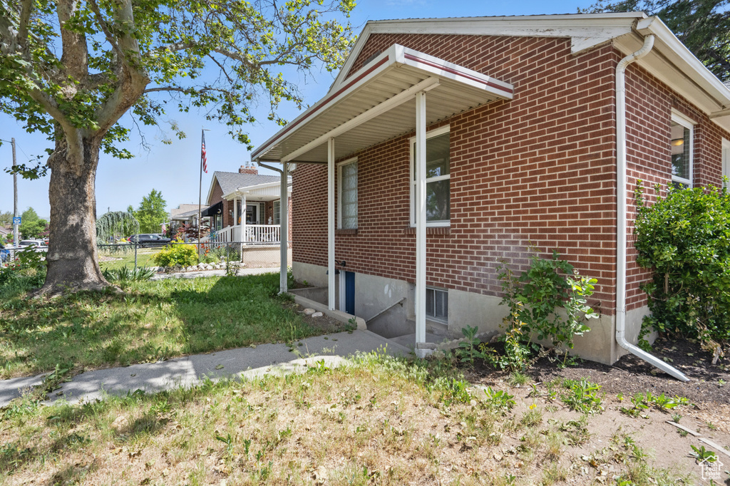 View of home's exterior with brick siding