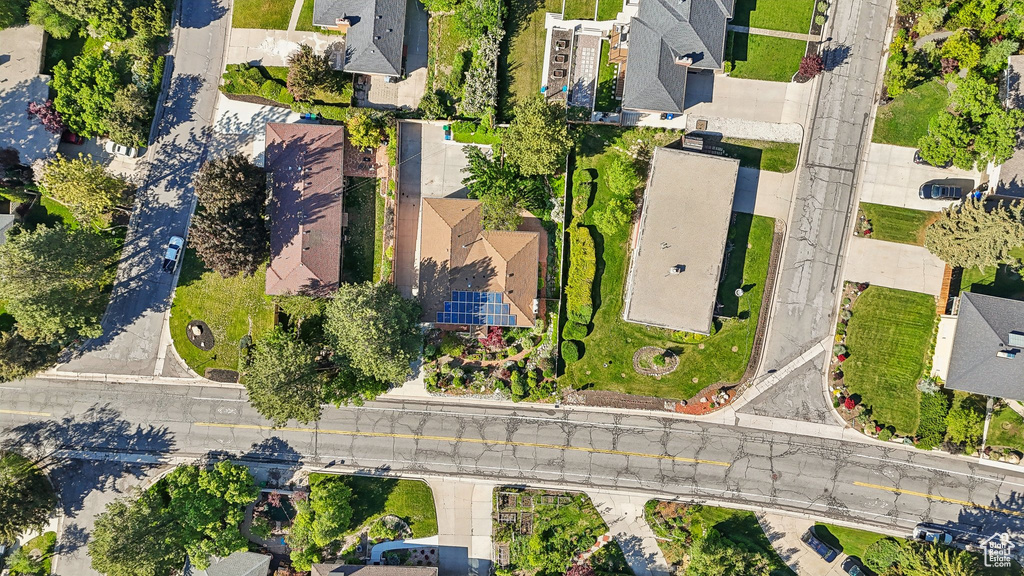 Aerial view of property's location featuring nearby suburban area