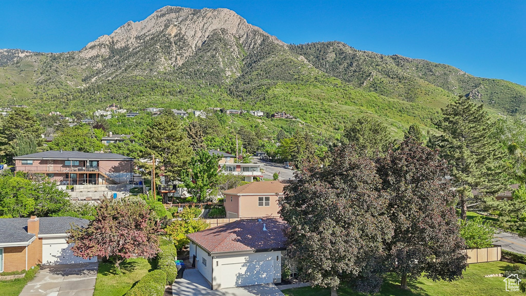 View of mountain background featuring nearby suburban area