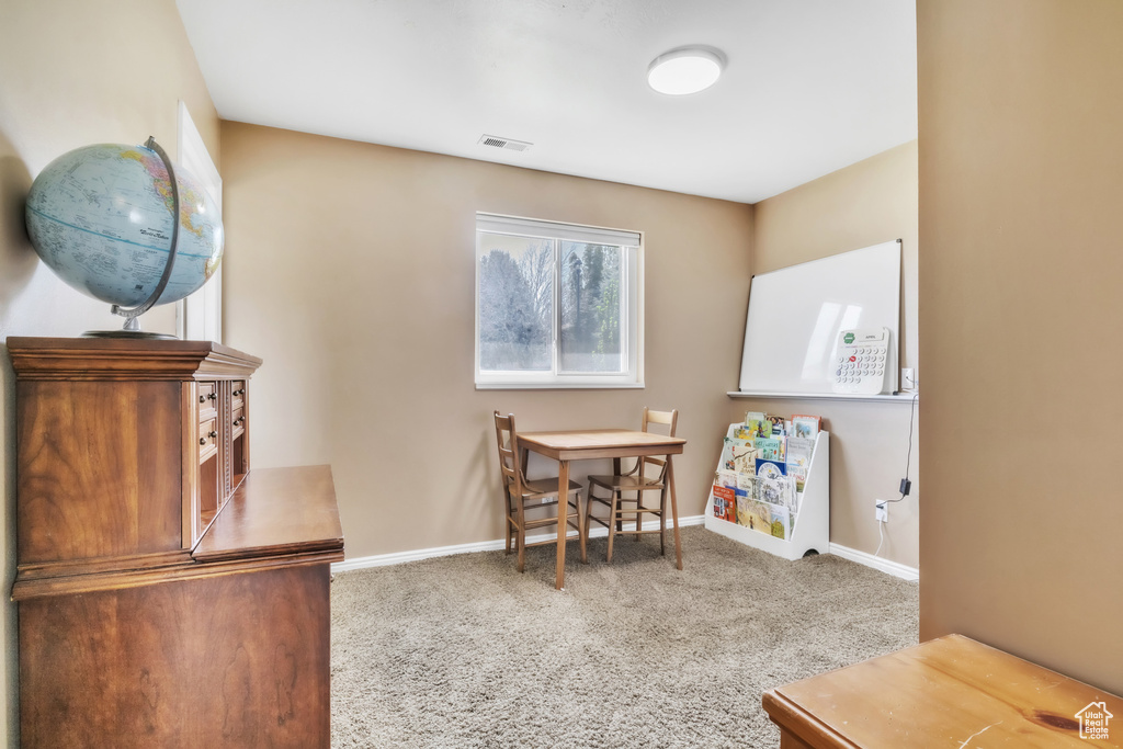 Playroom with visible vents, baseboards, and carpet