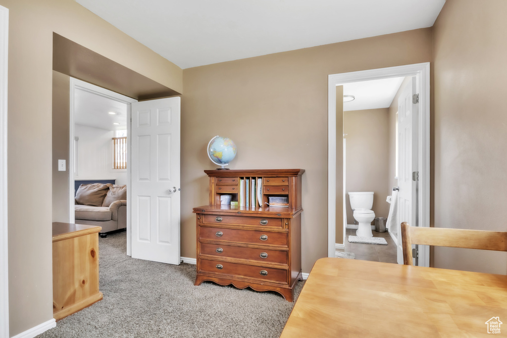 Carpeted bedroom with ensuite bath