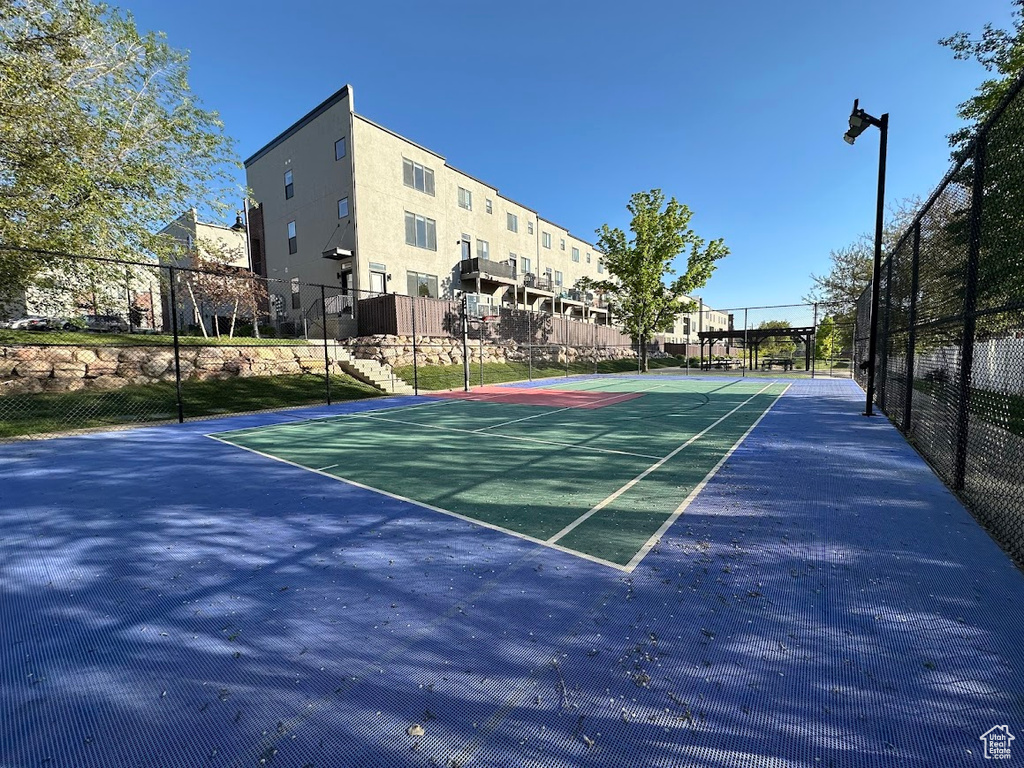 View of sport court with fence and community basketball court