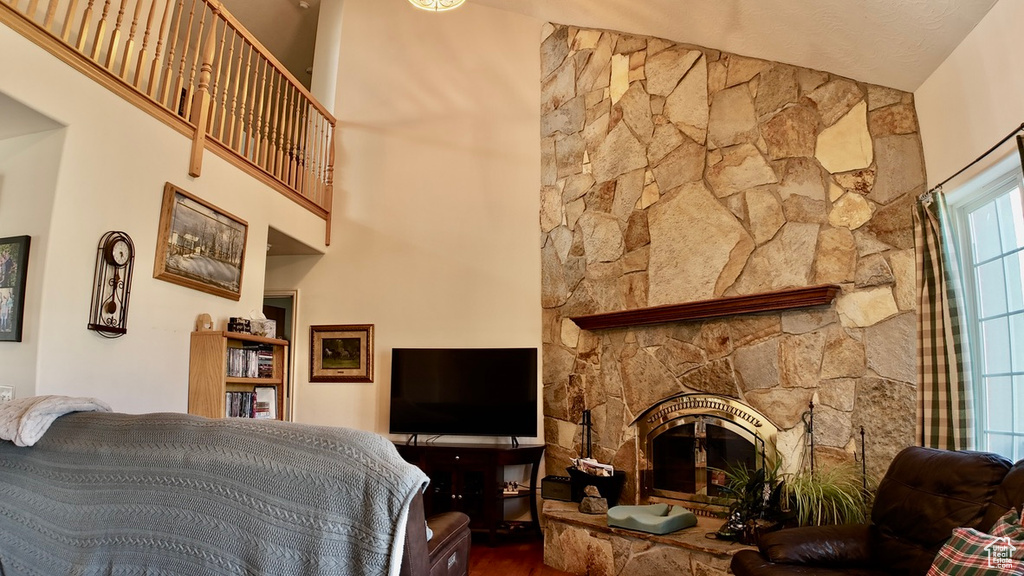Living room featuring wood finished floors and a fireplace