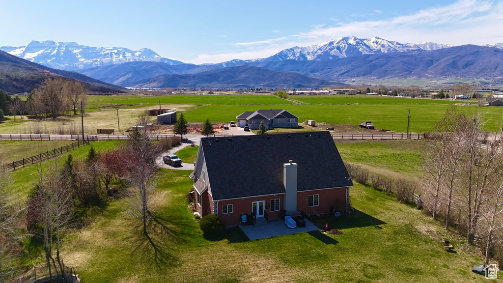 Drone / aerial view with a rural view and a mountain view