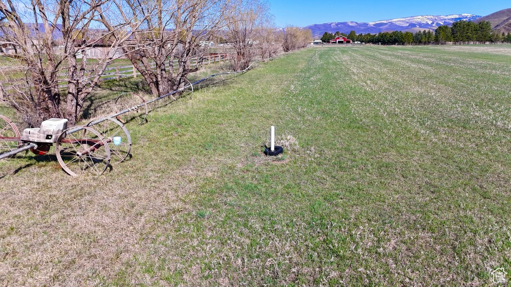 View of yard with a mountain view