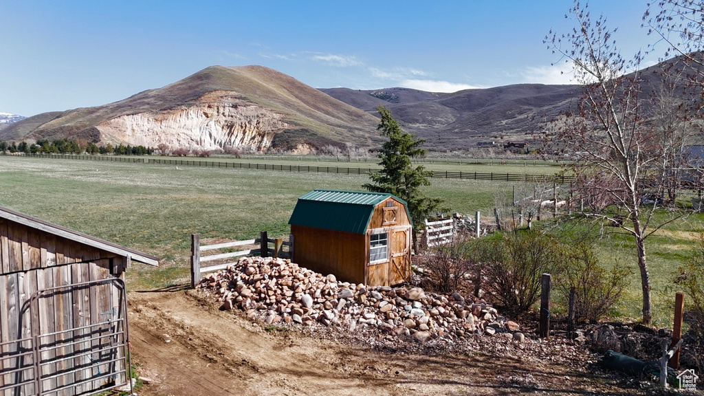 View of mountain feature with a rural view