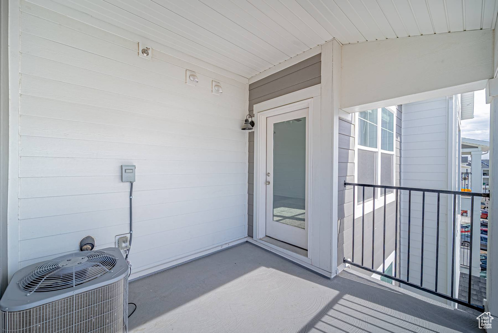 Exterior space featuring a balcony and central AC
