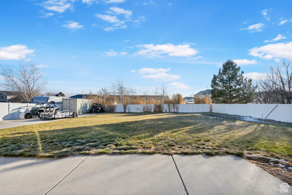 View of yard featuring a fenced backyard