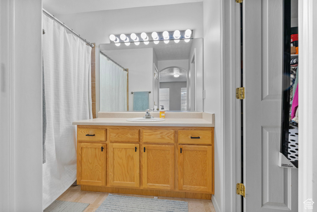 Full bathroom with vanity
