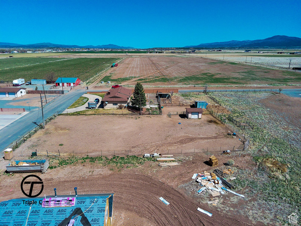 Drone / aerial view with a mountain view and a rural view